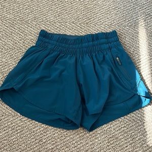 Track that lululemon mid rise 4 inch shorts